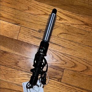 Black and Silver Curling Iron Brush